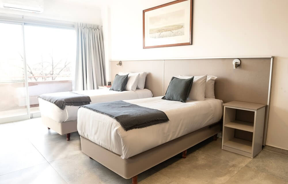 Chambre avec lits séparés de Filiberto By iPPA, appart hôtel à Buenos Aires