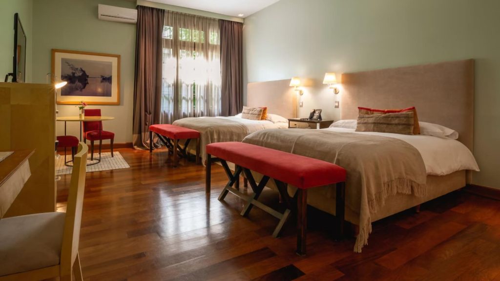 Chambre avec deux lits séparés de l'hôtel-boutique Hub Porteño à Buenos Aires